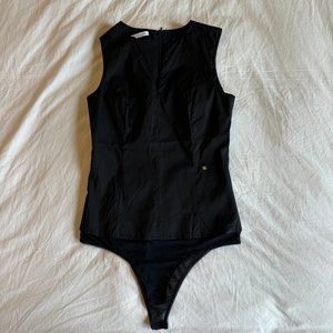 Caractére black bodysuit with snap closure - Size:6